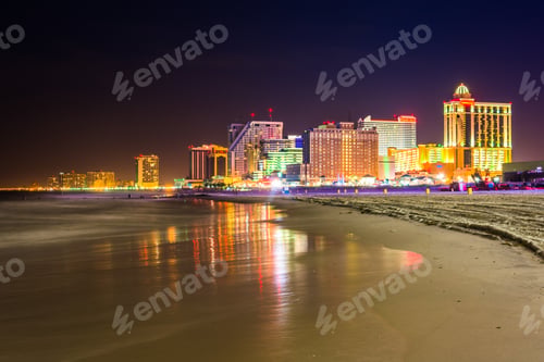 Preview: The Skyline And Atlantic Ocean At Night In Atlantic City, New Jersey.