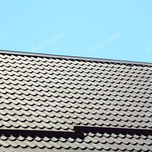 Preview: A fragment of a roof from a metal tile of dark red color. Quality Roofing