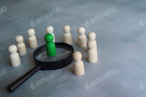Preview: Wooden dolls and magnifying glass