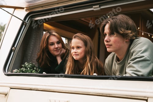 Preview: Three siblings children two sisters and older brother in trailer mobile home or recreational vehicle