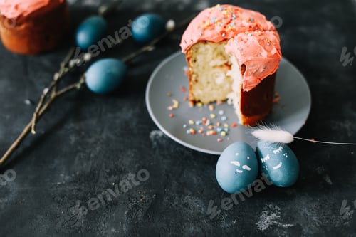 Preview: Tasty Easter cake, painted eggs, willow branches and toy bunny on table top view