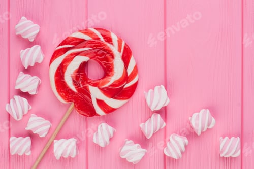 Preview: Composition with tasty lollipop on color background.