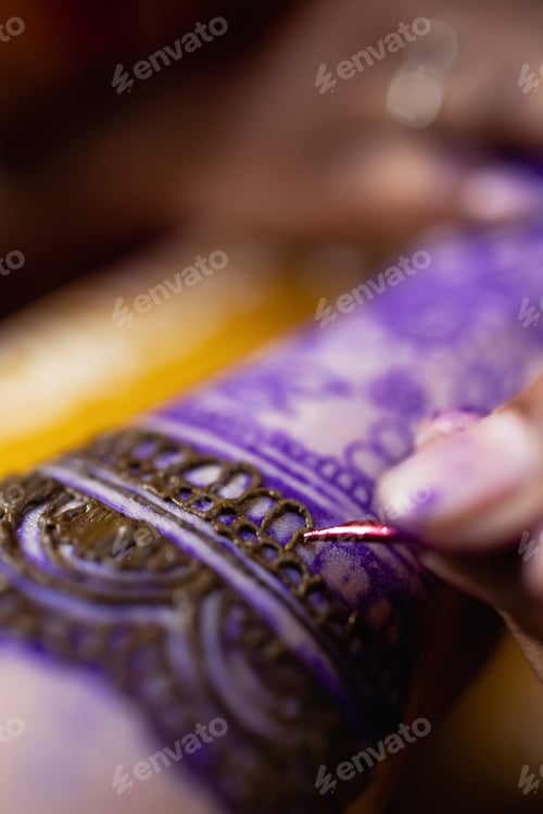 Preview: Applying Beautiful henna art on hands. Bridal design. Wedding Mehendi.
