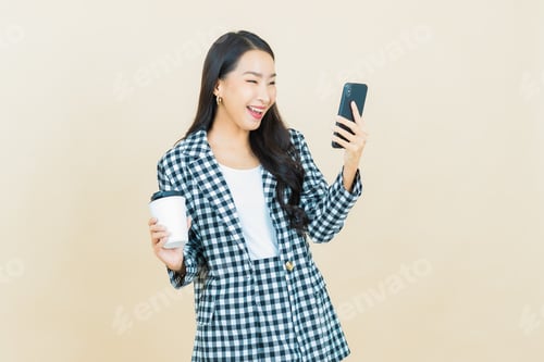 Preview: Smiling Woman Video Chatting Holding Coffee Cup