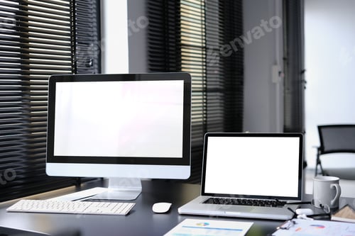 Preview: Modern office interior with blank computer monitor, laptop, document and supplies.