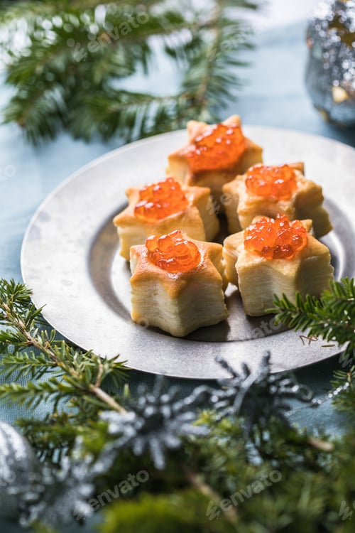 Preview: Christmas tree canape or sandwich with cucumber slice, salmon for festive x-mas snack. New year