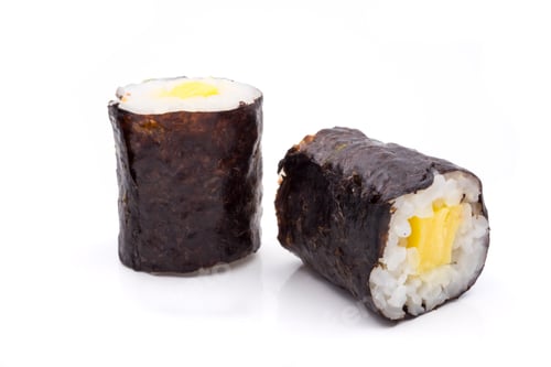 Preview: Sushi rolls, rice with egg and seaweed on white background, japanese food.