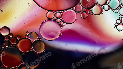 Preview: Abstract Colorful Food Oil Drops Bubbles and spheres Flowing on Water Surface