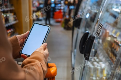 Preview: groceries shopping phone in woman hands