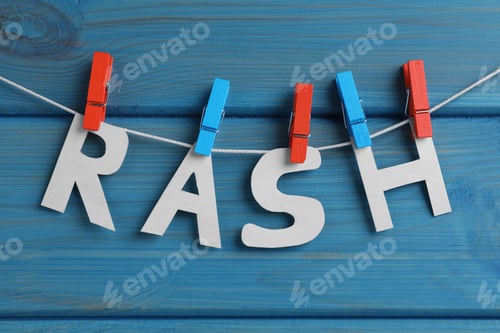 Preview: Word Rash hanging on turquoise wooden background