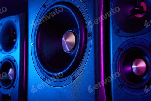 Preview: Two sound speakers and subwoofer on dark background with neon lights