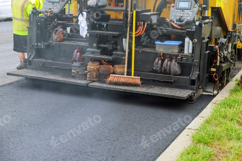 Preview: Detail of asphalt paver machine during road industrial pavement truck laying fresh asphalt on