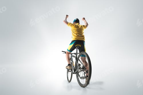 Preview: The Bicyclist On Gray, Studio Shot.