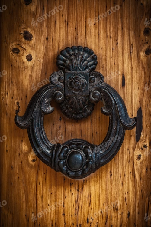 Preview: Antique handle of a solid wood door.
