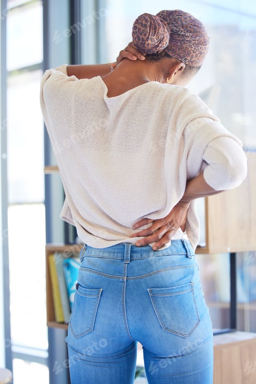 Preview: Black woman, back and neck pain in stress, tired or overworked from working at home. African Americ