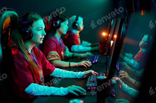 Preview: Teenage Girls Gamers Team Competing in Esports Tournament Using Computers