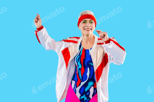 Preview: Happy and funny senior old woman on colorful background
