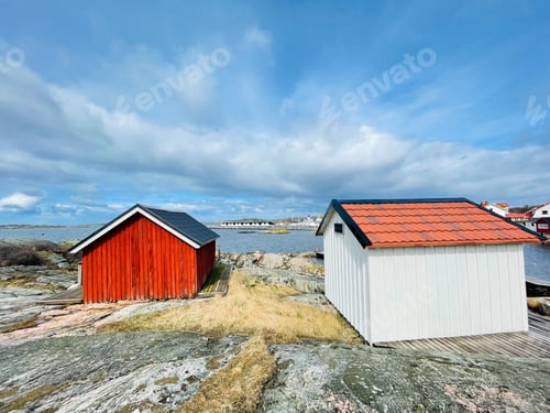 Preview: A view of red wooden houses on Vrango Archipelago island .