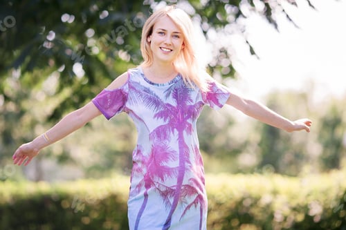 Preview: Pregnant woman in outdoor park, warm weather