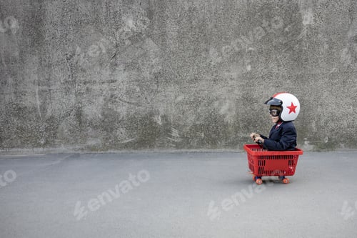 Preview: Funny businessman riding shopping cart outdoor