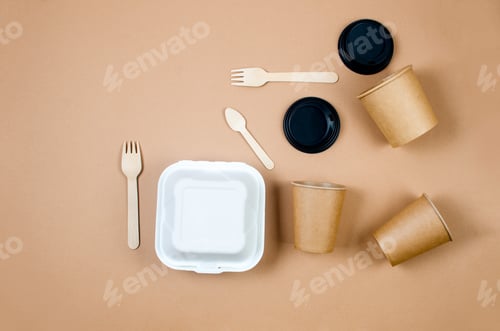 Preview: Top view on different eco-friendly disposable kraft paper tableware