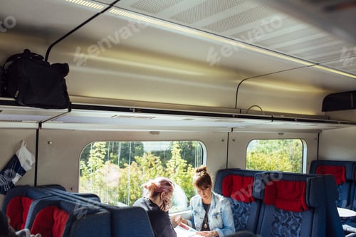Preview: Women travelling by train