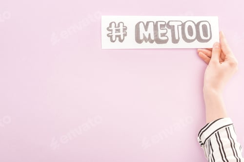 Preview: cropped view of woman holding paper with hashtag me too on light pink background