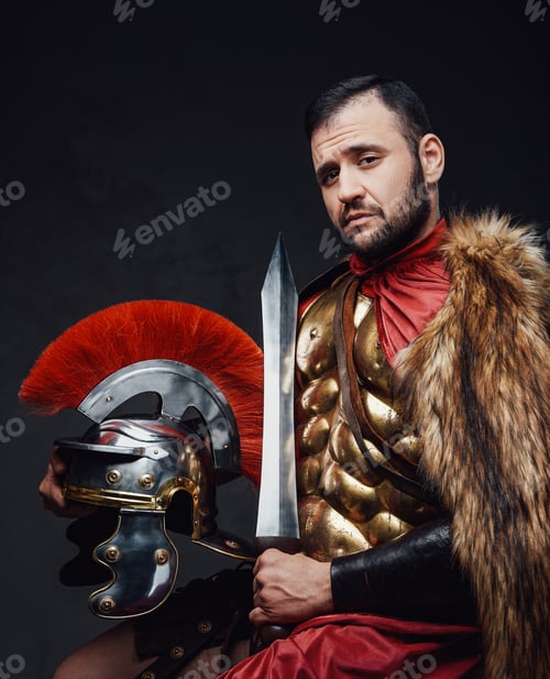 Preview: Studio shot of roman officer with sword and helmet