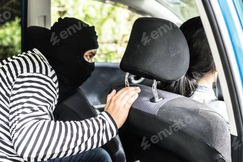 Masked Intruder Threatens Woman Inside a Car