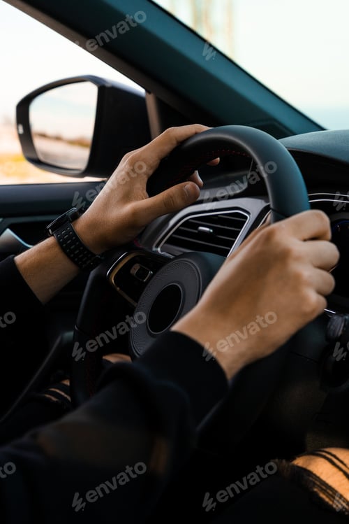 Preview: Holding the handlebars of a car
