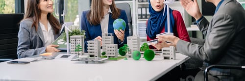 Preview: Group of alternative energy engineers discussing a project with a worker businesspeople a meeting