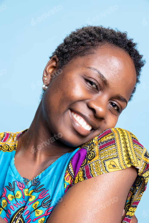 Preview: Positive joyful female model smiling and representing traditional fashion style