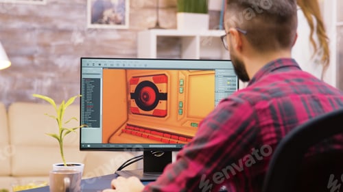 Preview: Close up shot of game developer working on a new level of game
