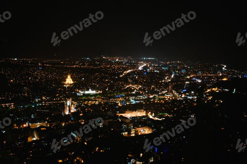 Preview: View from Mtatsminda mountain of night sky over new and old houses, tower, city, town, and streets