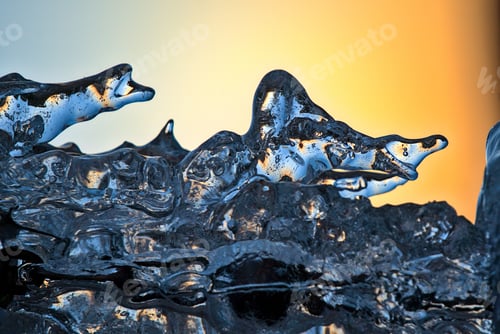 Preview: Stunning close-up shot of glistening ice with attractive curved and textured shapes