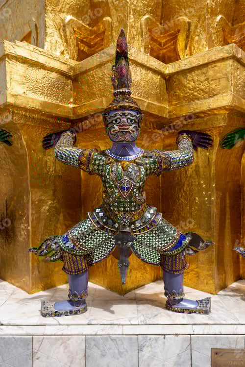 Preview: Vertical shot of the statue of a Hindu character Yaksha in The Grand Palace of Bangkok