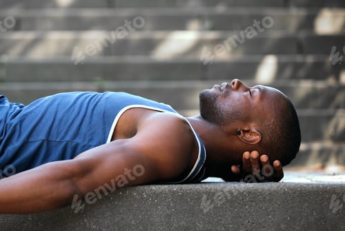 Preview: African american man sleeping outside