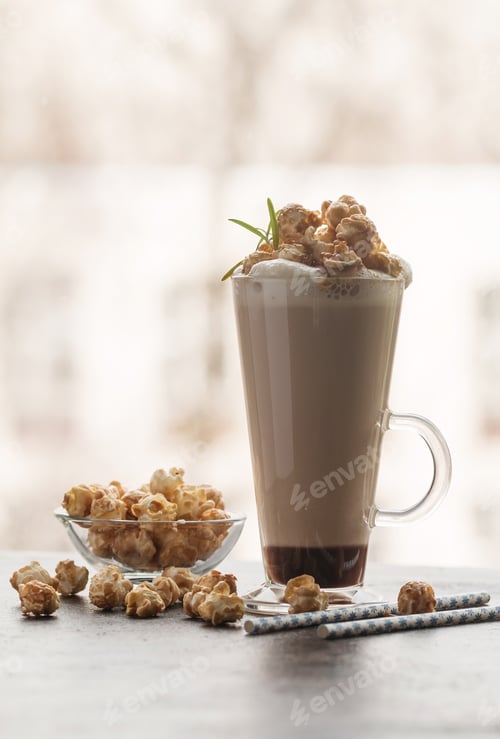 Preview: Glass of coffee with popcorn
