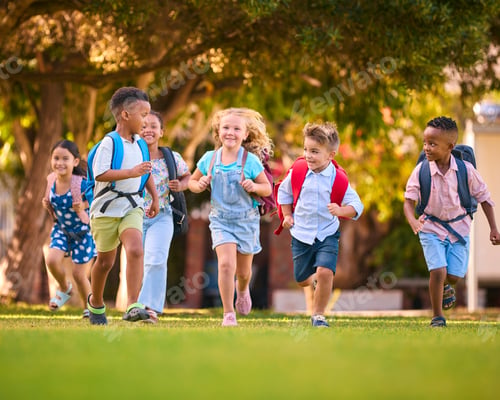 Preview: Multi-Cultural Primary Or Elementary School Students With Backpacks Running Outdoors At End Of Day