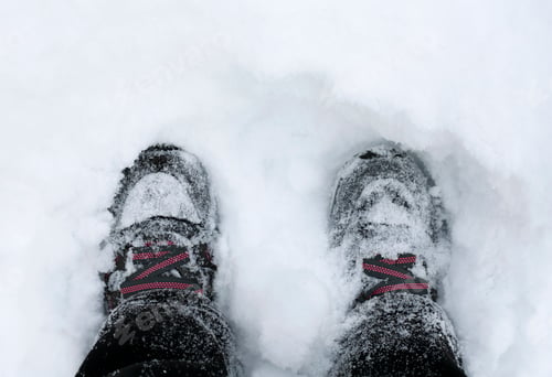 Preview: Shoes in snow. View from above. Walking in snow