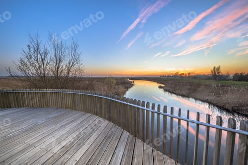 Preview: Planking balustrade sunset over swamp