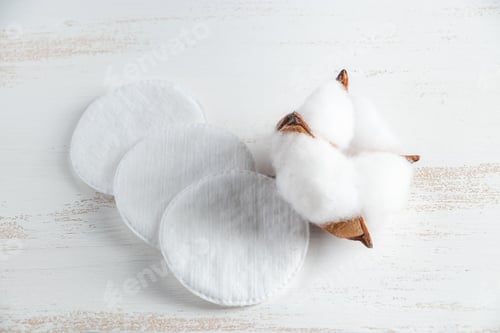 Preview: Cotton cosmetic pads on white background. Facial care concept.