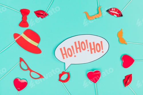 Preview: top view of composition of holiday masks and decorations, isolated on turquoise