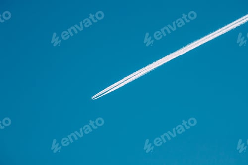 Preview: Airplane In The Sky With Plane Trails