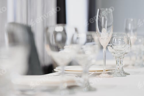Preview: Glasses on the festive table setting. Wedding table decor concept.
