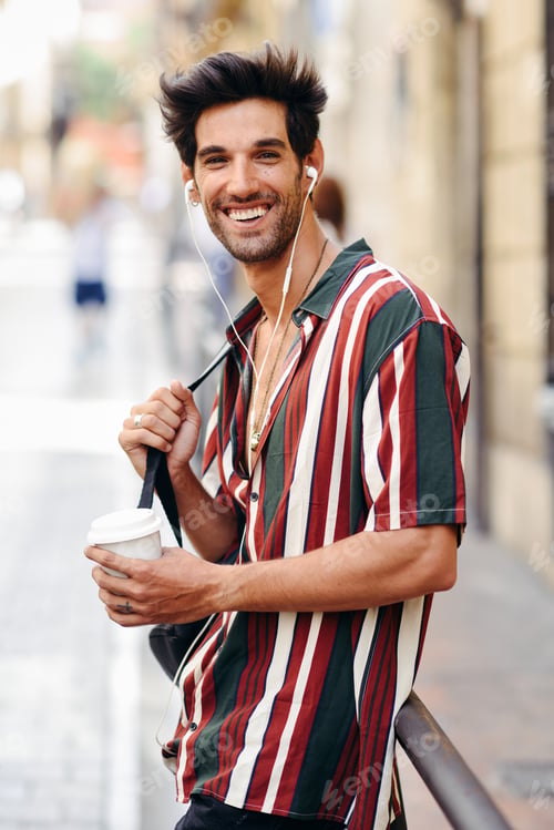 Preview: Young male traveler enjoying the streets of Granada, Spain