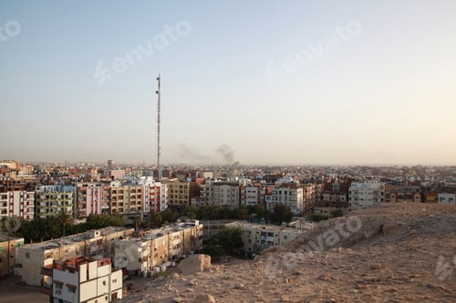 Preview: city of Hurghada. Top view of the houses. Black smoke in the city