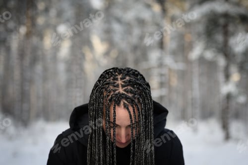 Preview: Young woman with African braids