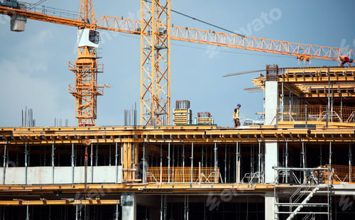 Preview: Large construction site including several cranes working on a building complex