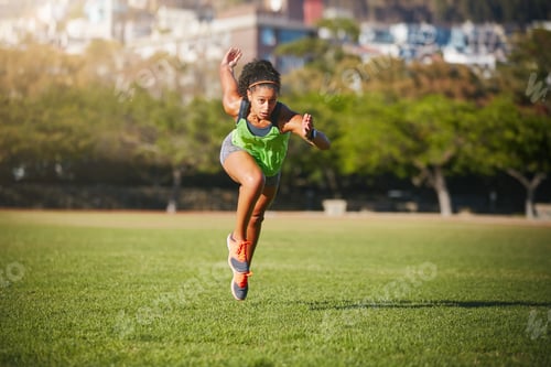 Preview: Sprint to the finish line of your goals. Shot of a sporty young woman exercising outdoors.